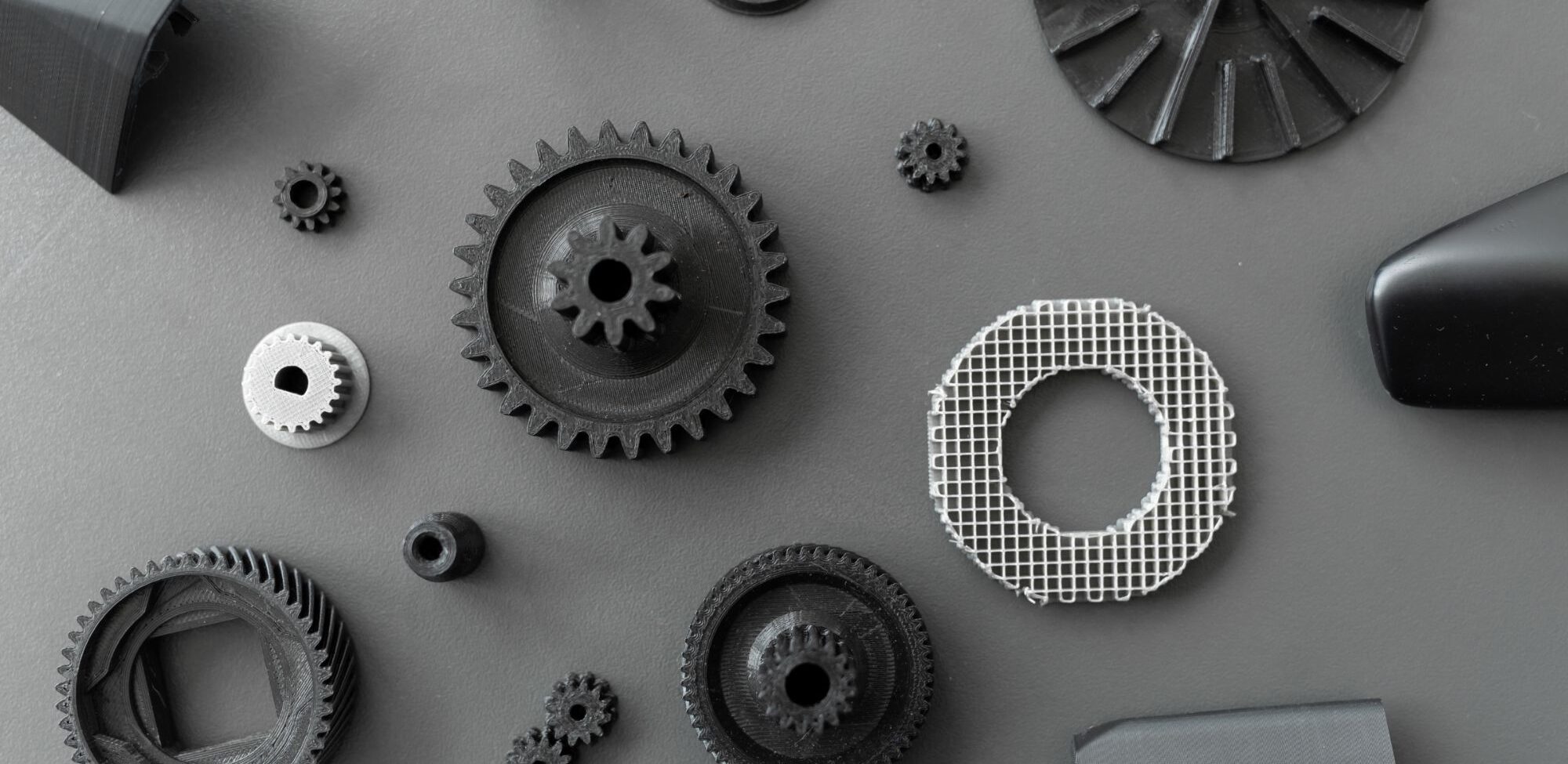 3d Printed Objects On The Table In The Laboratory NXUDSW5 1 1 2000x975